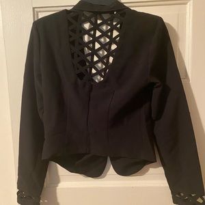 Black, cropped material girl blazer
